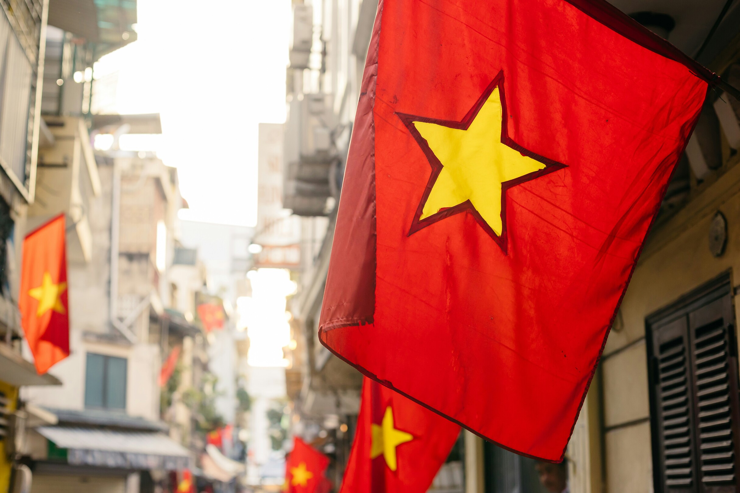 Vietnam flags in Hanoi feature