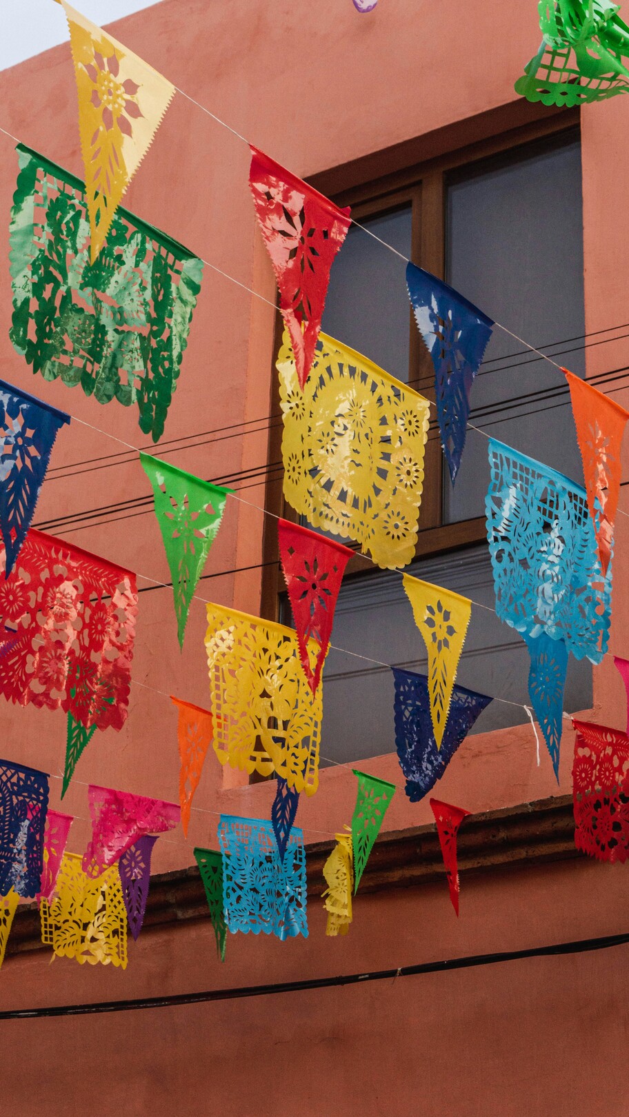 Paper flags hanging in Jalatlaco Oaxaca Mexico feature