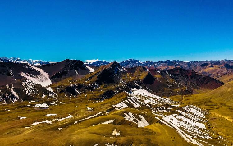 Vinicunca (Rainbow Mountain) in the distance