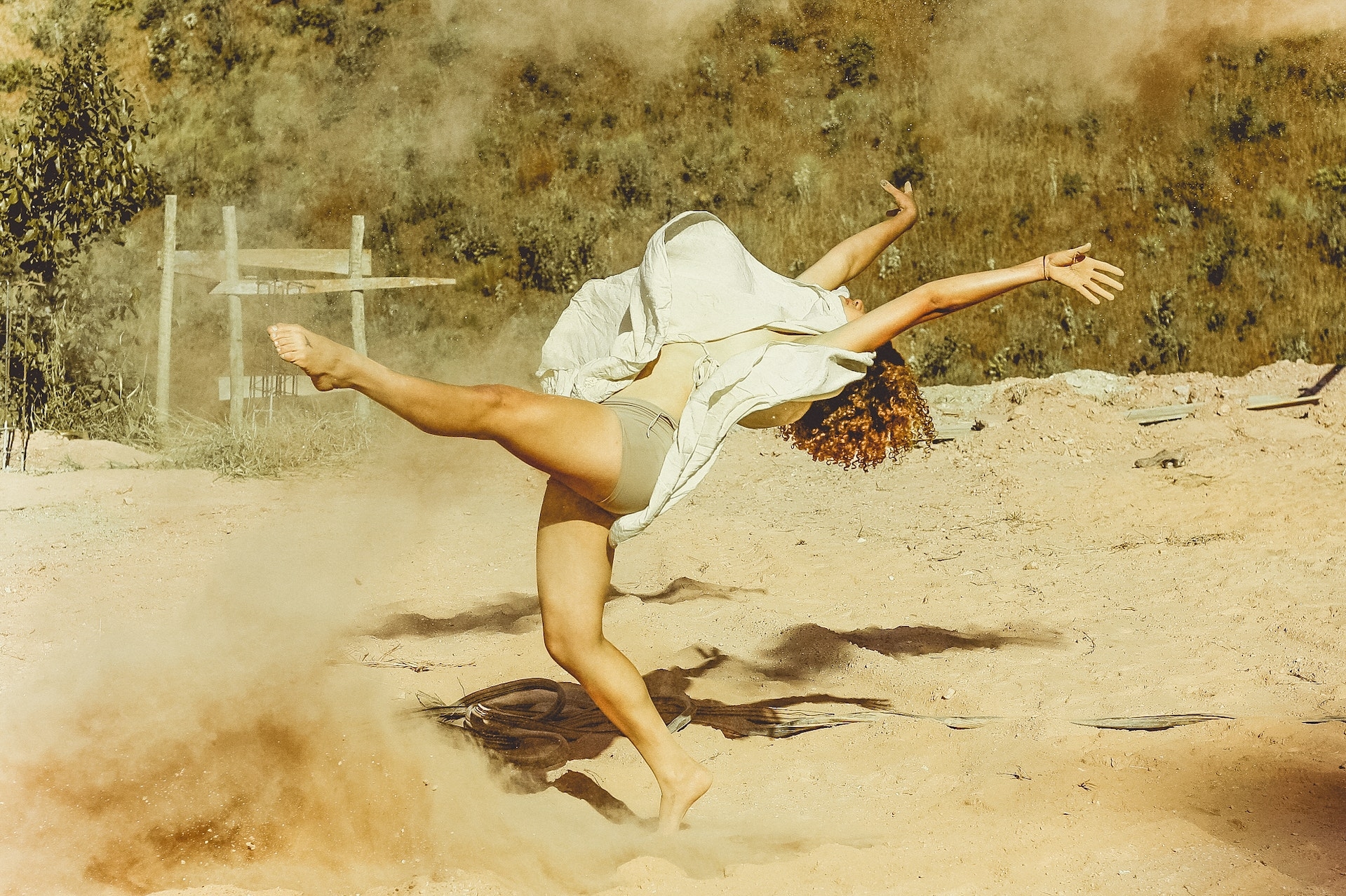 Woman dancing in desert