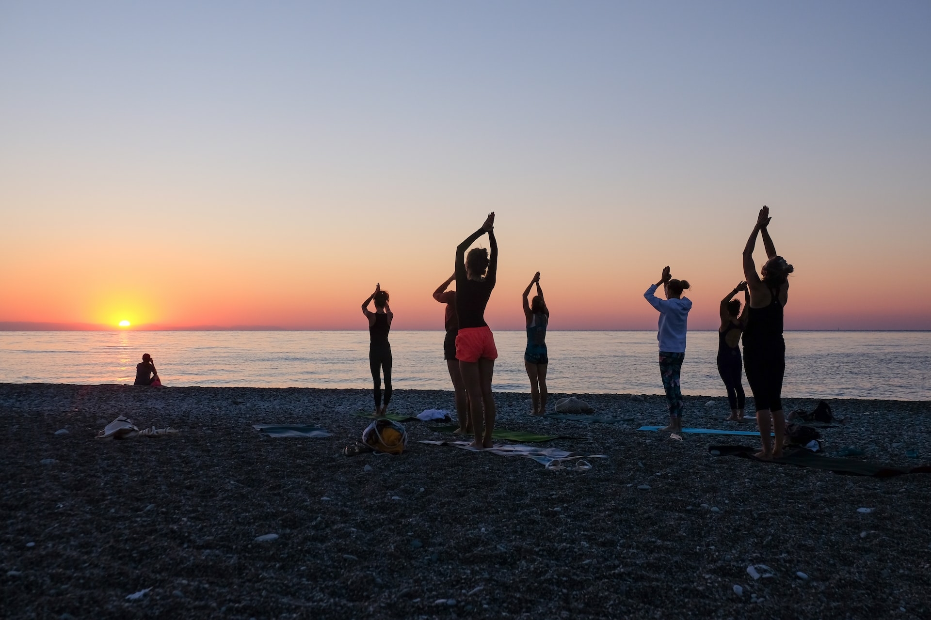 Stretched out on the sand: Find your bliss with beach yoga - Gulfshore  Business