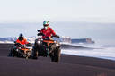 ATV ride on black sand beach