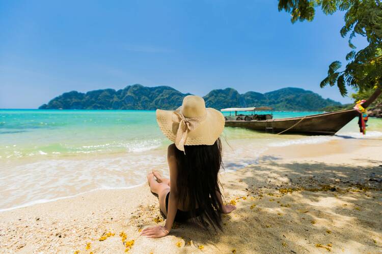 Woman on beach in Phuket