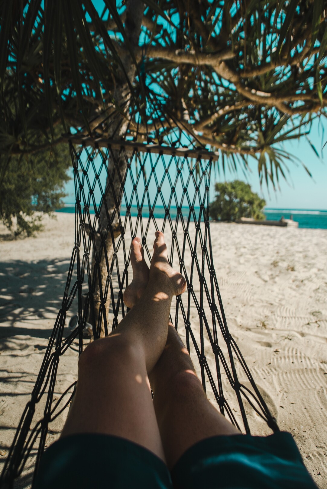 Generic image of man relaxing on beach