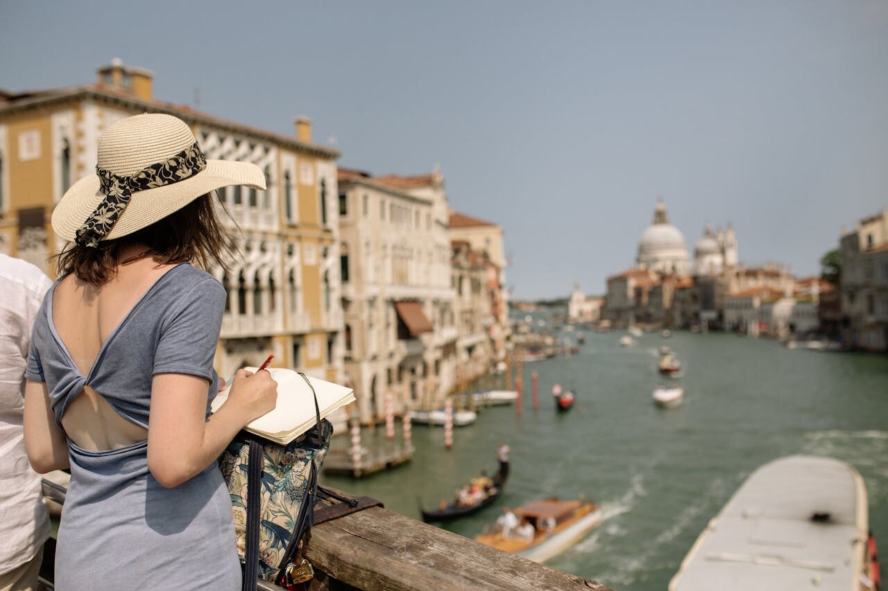 Woman sketching - Venice, Italy - feature