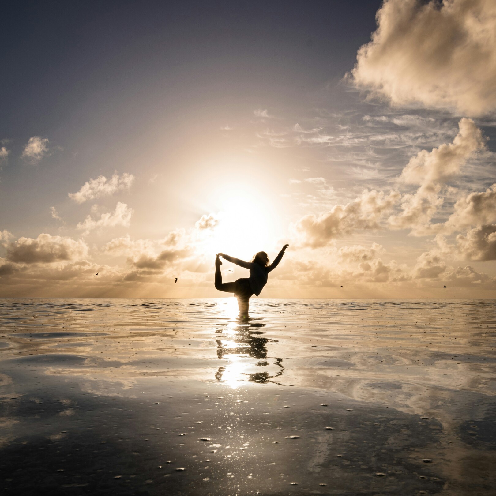 Yoga in the ocean - featured