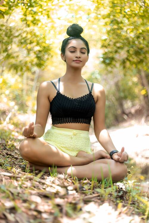 Woman meditating in nature