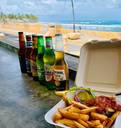 Ocean view with food and drinks