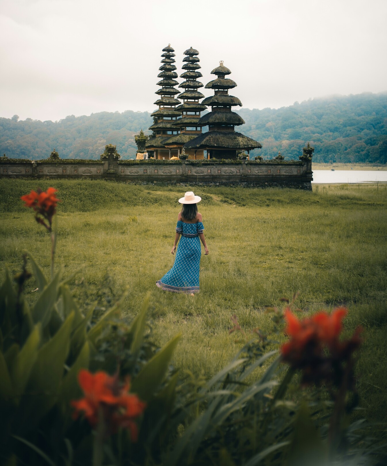 Bali, Indonesia woman with scenic temple view feature