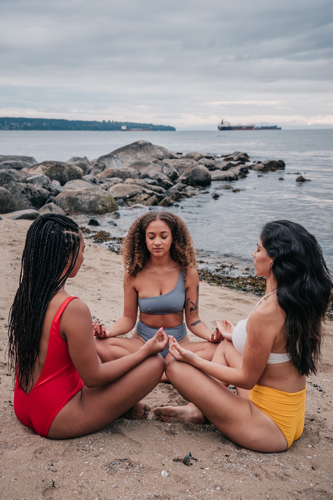 Women beach meditation